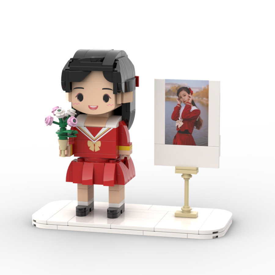 Custom mini brick figure girl in red school-style dress holding flowers with matching framed photo – personalised gift display by MiniMate Store