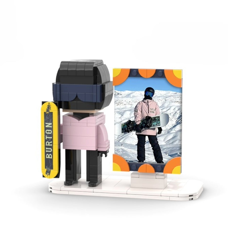 Custom mini brick figure in snowboard gear with Burton board and matching snowboarding photo in display frame – MiniMate Store